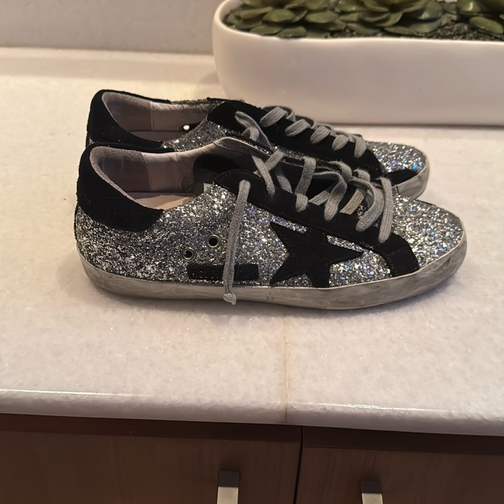 Golden Goose woman’s glitter sneakers